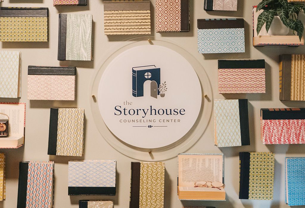 Storyhouse Counseling Center logo displayed among patterned journals